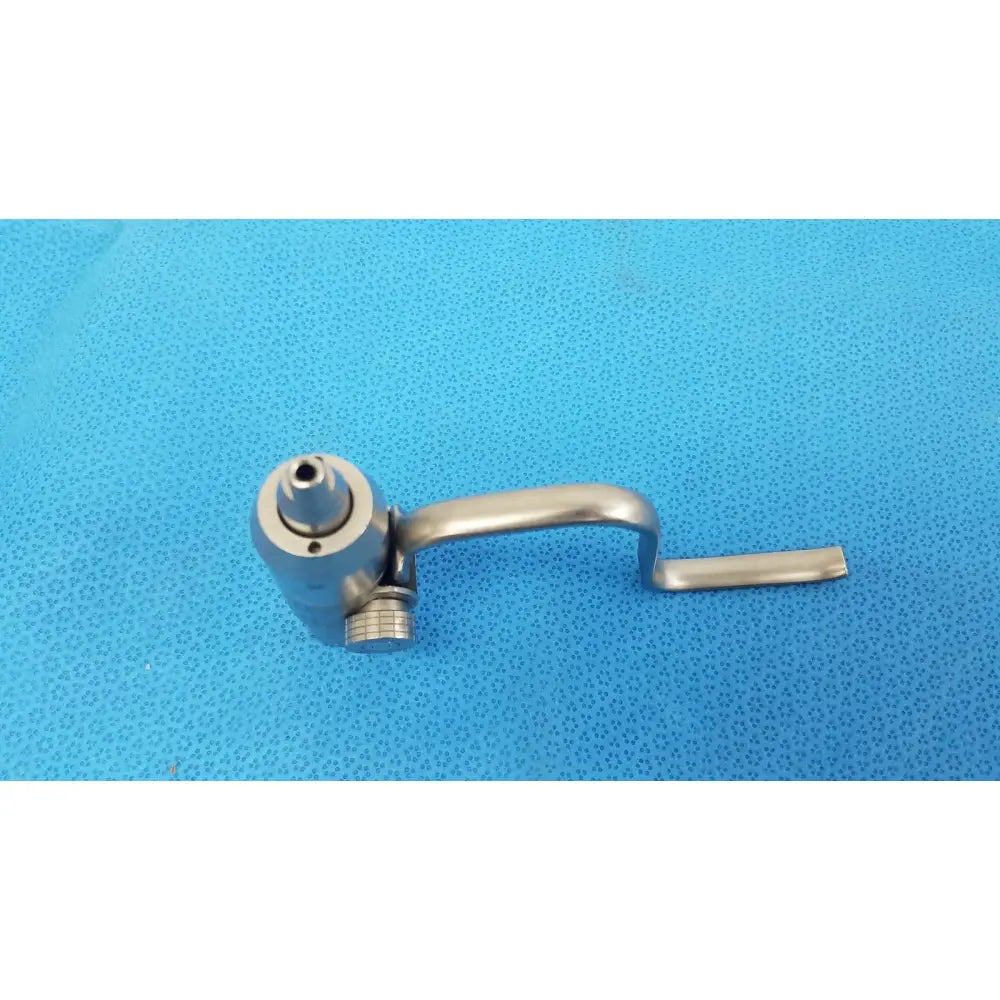 Stainless steel stryker instruments pin collet surgical handpiece with curved handle and textured adjustment knob
