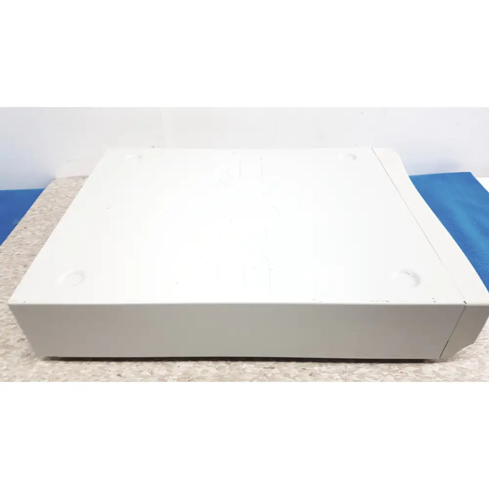 White rectangular stryker iswitch wireless universal foot control pedal with rounded edges and matte finish for surgical use