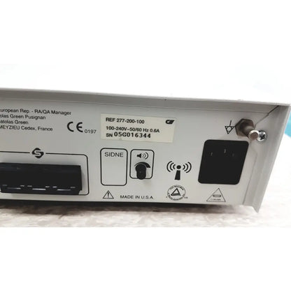White stryker iswitch wireless universal foot control pedal with black power input and ce mark made in usa backside view