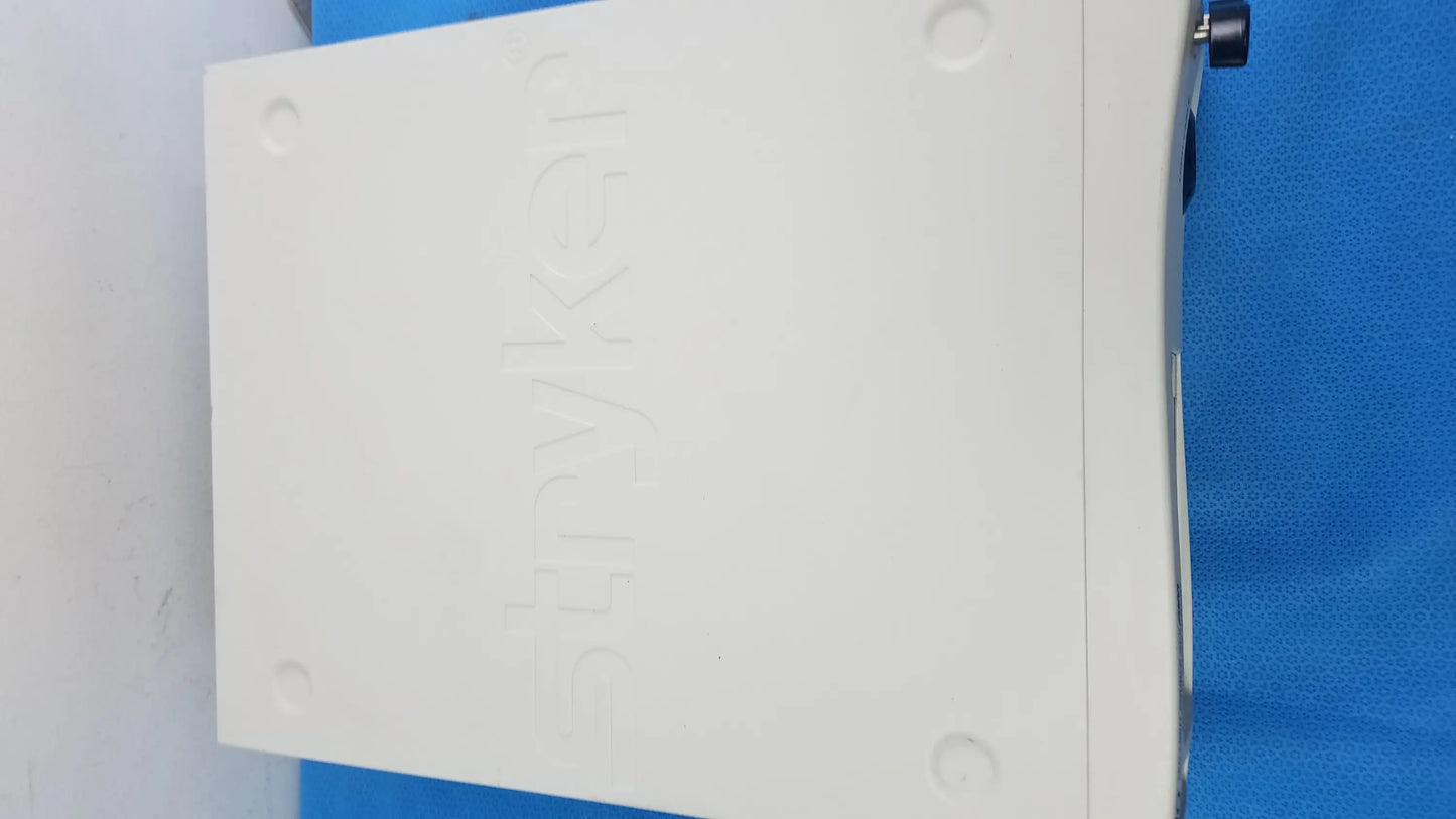 White rectangular back panel of stryker l10 led light source with dell logo and four mounting holes for advanced imaging modality