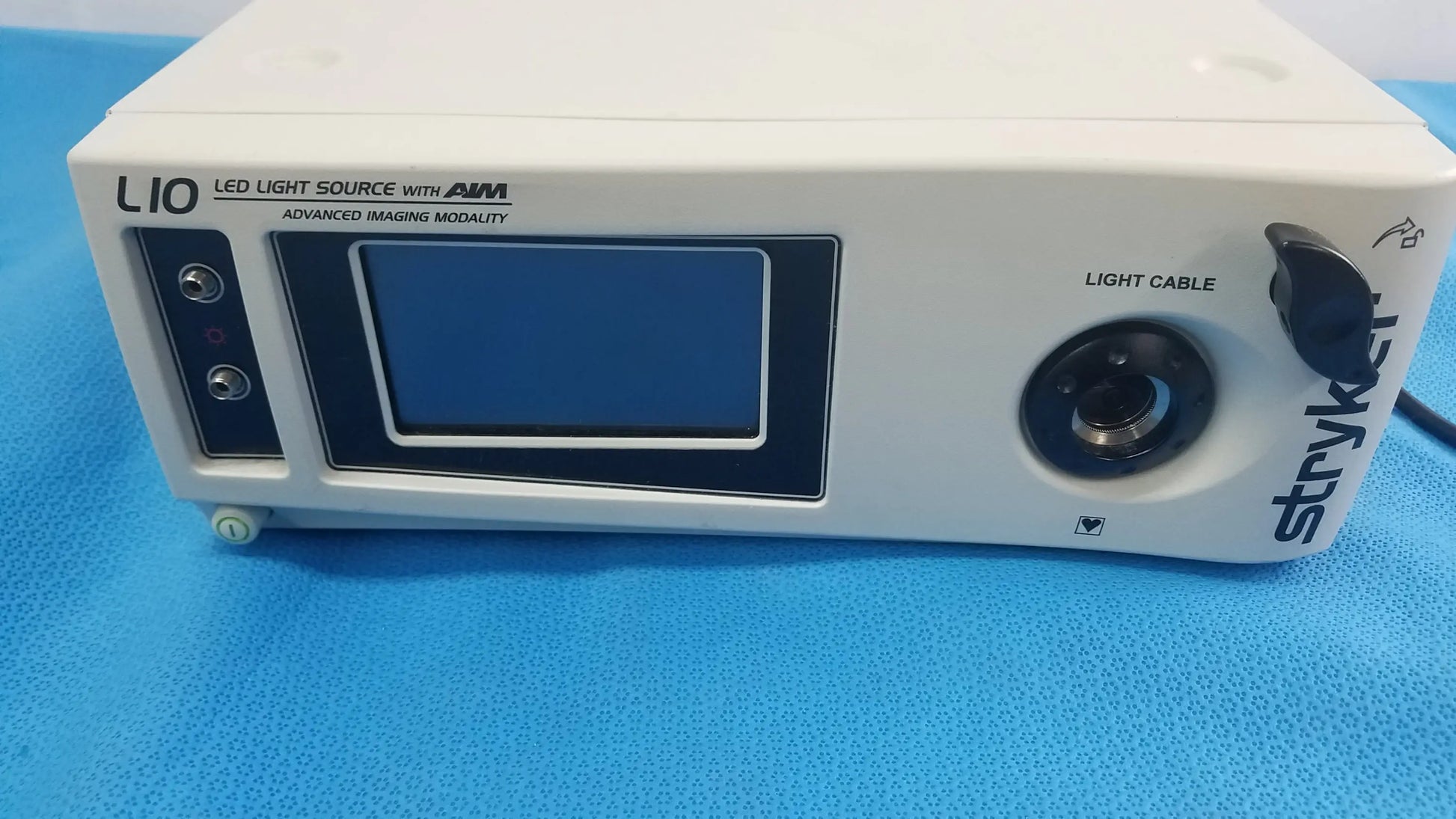 Stryker L10 Led light source in white with a black control panel featuring aim advanced imaging modality technology