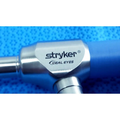Silver metallic autoclavable 10mm 134ºc surgical instrument with stryker lot and ideal eyes branding in sterilization tray