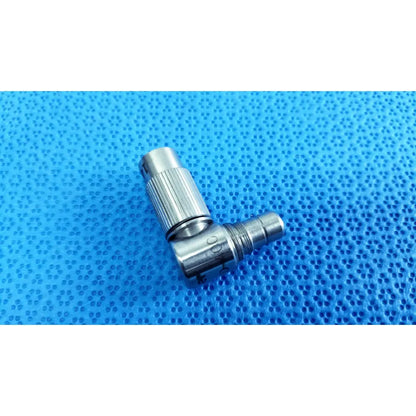 Silver metal right-angle connector with threaded ribbed grip and two ports in stryker lot autoclavable 10mm 134ºc scope