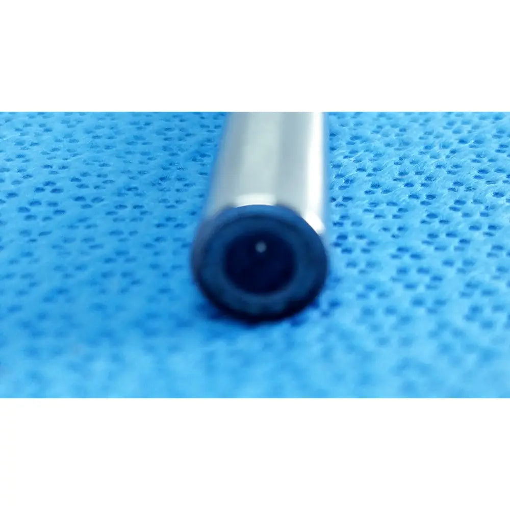 Silver-colored cylindrical stryker lot autoclavable 10mm 134ºc medical scope with black circular tip and central dot
