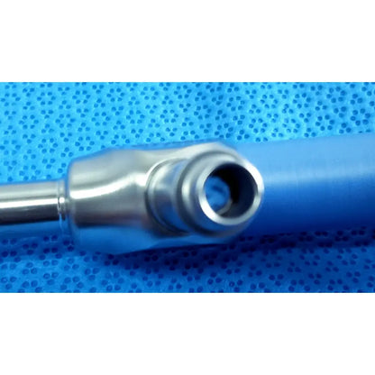 Silver metallic surgical instrument with cylindrical blue handle from stryker lot autoclavable 10mm 134ºc scope set