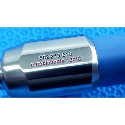 Silver metallic stryker lot autoclavable 10mm medical instrument with blue rubber grip marked 502-210-010 autoclavable 134ºc