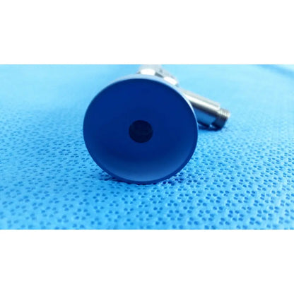 Blue circular end cap with central hole attached to metallic body in stryker lot autoclavable 10mm 134ºc scope product