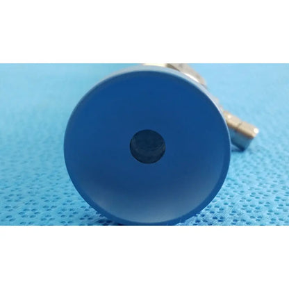 Blue circular plastic cap with central hole for stryker lot autoclavable 10mm 30º scope with sterilization tray
