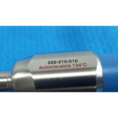 Silver metallic cylindrical stryker lot autoclavable 10mm 30º scope with engraved red text and sterilization tray