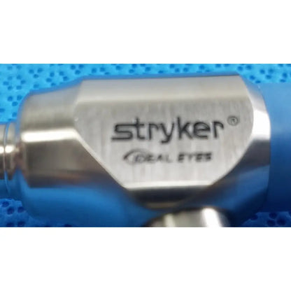 Silver metallic stryker lot autoclavable 10mm 30º scope with brushed finish and blue protective cover in sterilization tray