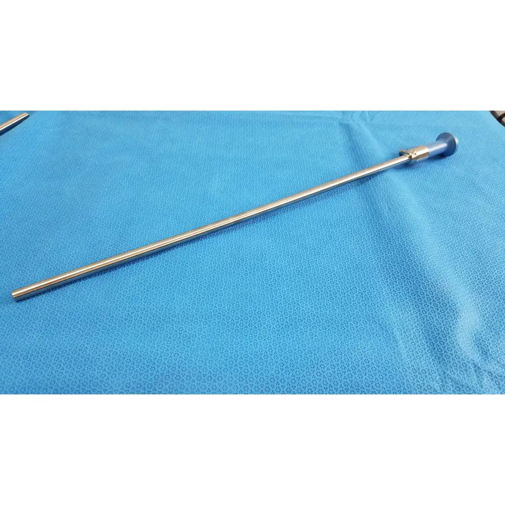 Stainless steel stryker lot autoclavable 10mm 30º surgical endoscope with blue-tipped handle and sterilization tray