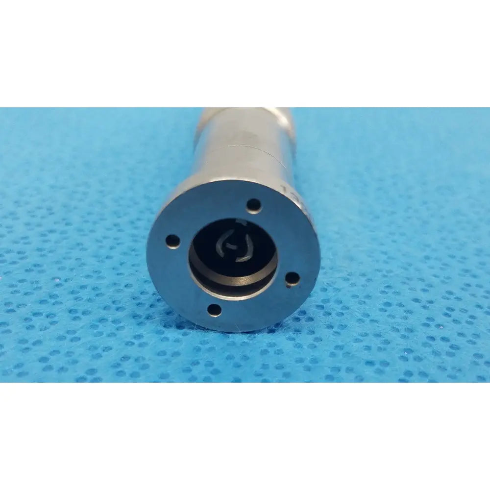 Silver metallic cylindrical component with flanged end and threaded bore for reuse medical applications stryker md series straight