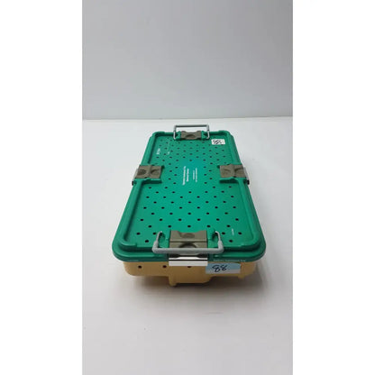 Green and beige stryker optional instrument tray with perforated metal lid, latches, and labeled compartments for instrument ray gamma3 system