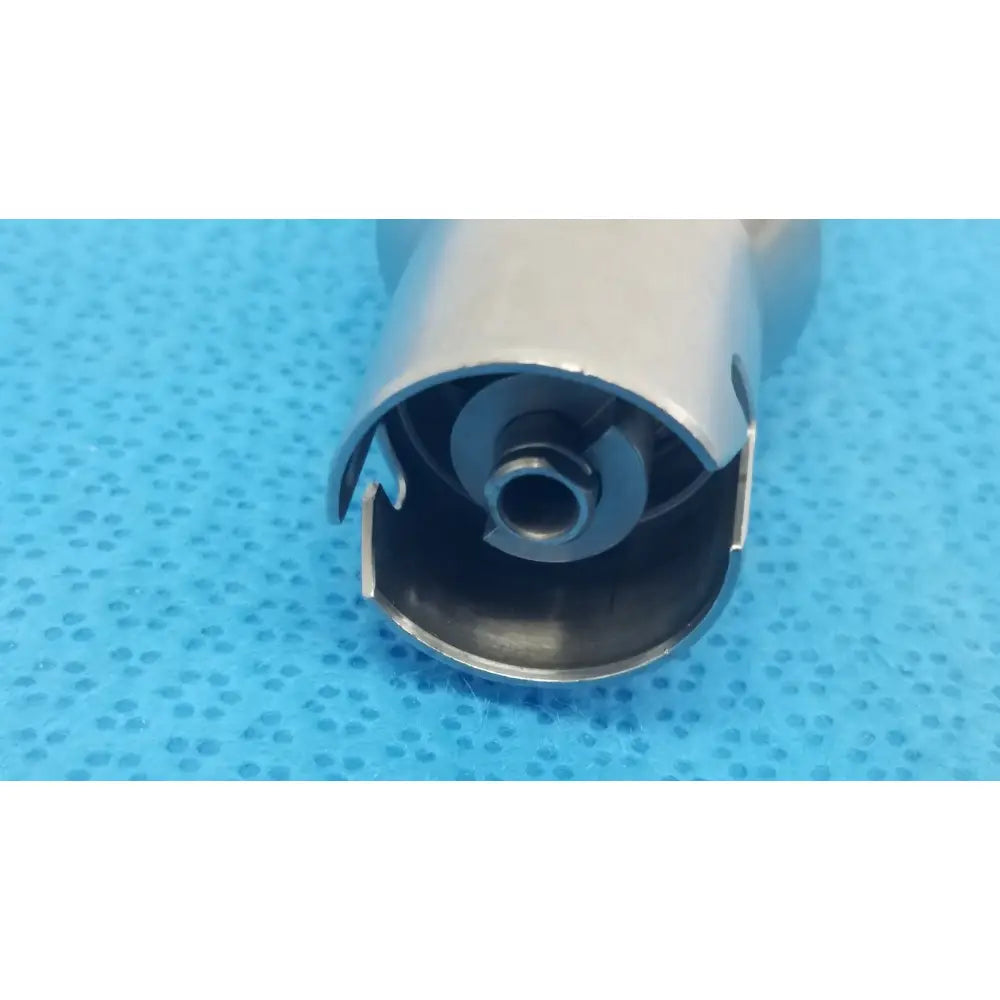 Silver metallic sewing machine presser foot with circular opening and curved edges for stryker orthopedic reuse medical use