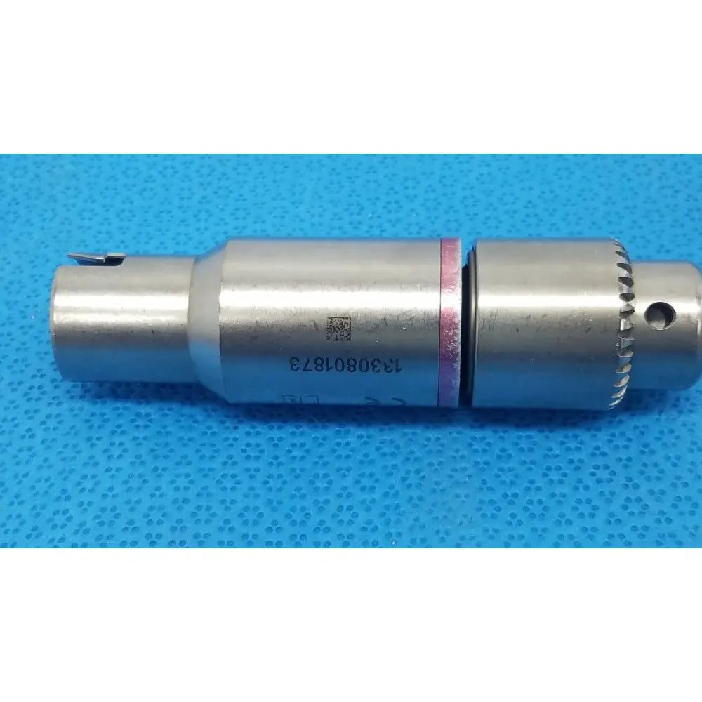 Silver metallic stryker orthopedic 1/4 inch reamer with textured grip and engraved serial number for reuse medical use