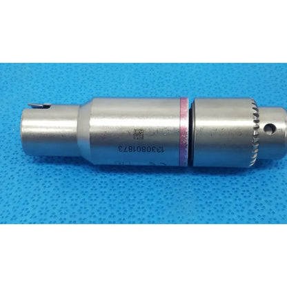 Silver metallic stryker orthopedic 1/4 inch reamer with textured grip and engraved serial number for reuse medical use