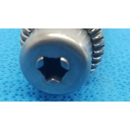 Silver-colored metal stryker orthopedic 1/4 inch reuse medical reamer with hexagonal drive and serrated edge