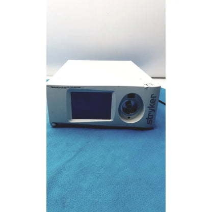 White stryker pneumo laparoscope with rectangular screen and circular lens housing for high flow insufflator use