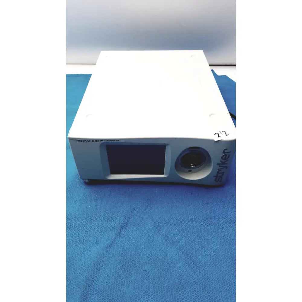 White rectangular stryker pneumo sure xl high flow insufflator with small screen and lens for medical use