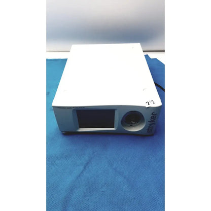 White stryker pneumo high flow insufflator with surgical microscope lens and small front screen for medical use