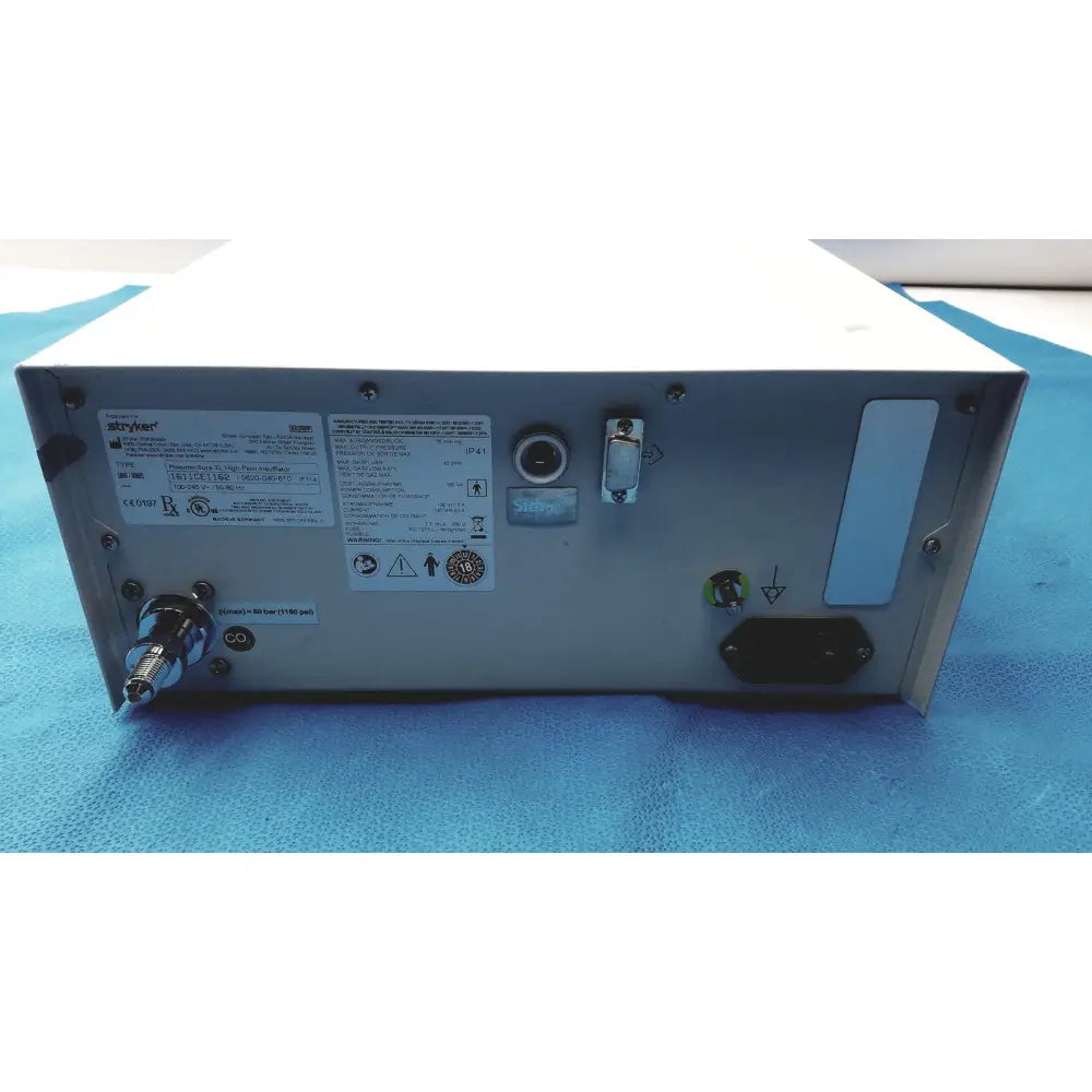 Silver metallic skywor power supply unit showing labeled connectors and specifications for stryker pneumo high flow insufflator