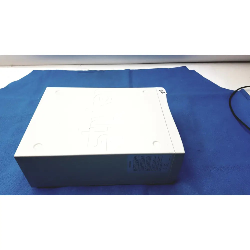 White rectangular box with embossed branding and label on the side for stryker pneumo sure xl high flow insufflator