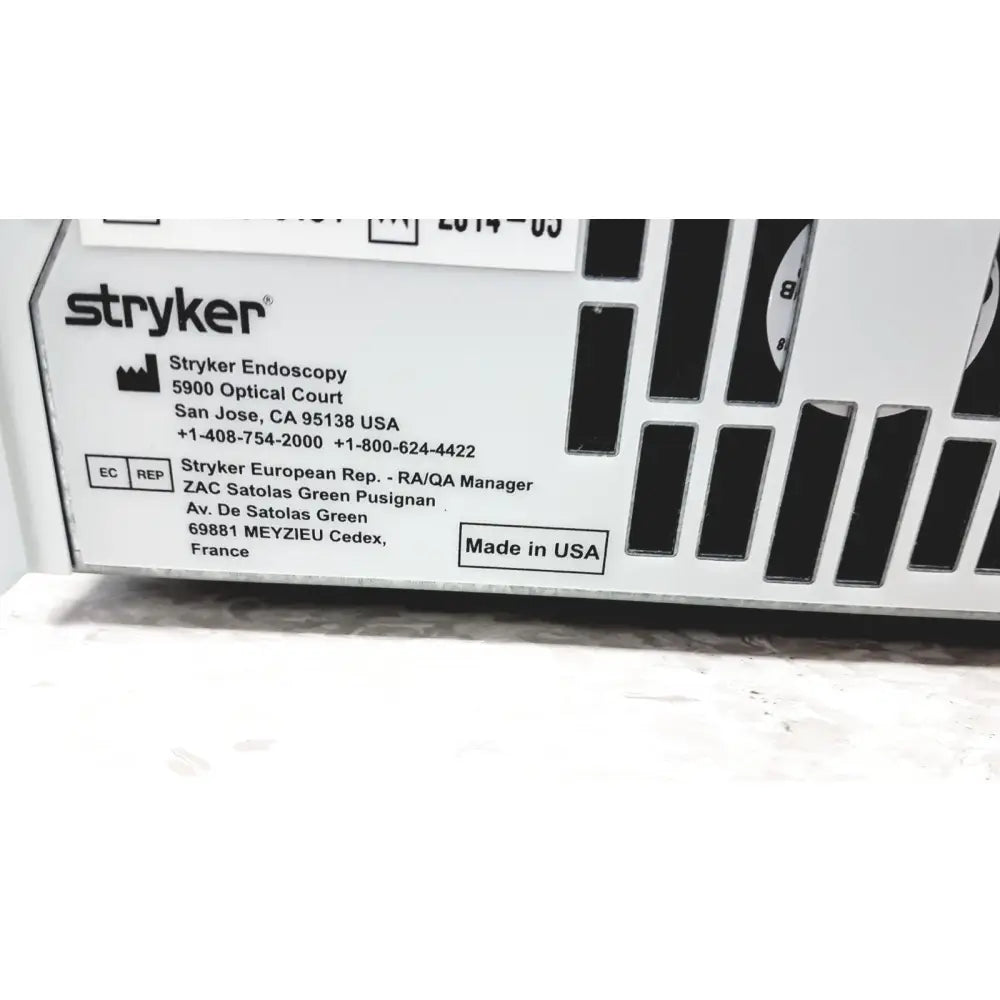 White stryker precision light source surgical illumination unit with black vents and usa label on the back side