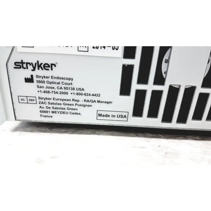 White stryker precision light source surgical illumination unit with black vents and usa label on the back side