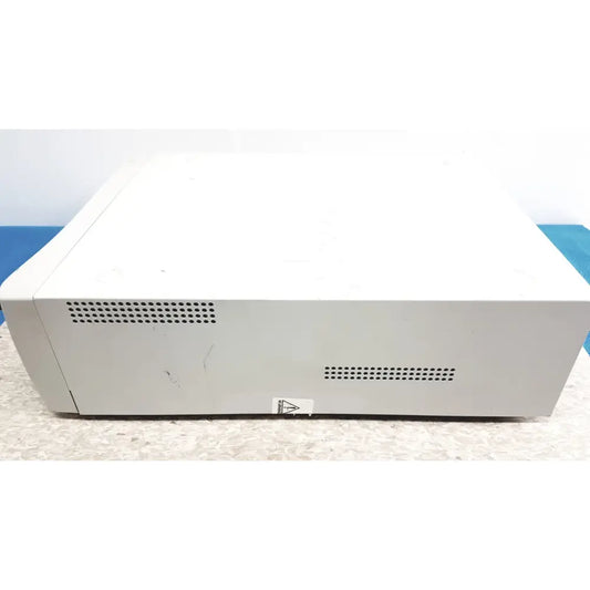 White rectangular stryker precision light source surgical illumination unit with perforated ventilation grilles on the sides