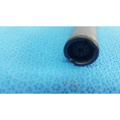 Gray cylindrical stryker remb electric micro drill handpiece with black circular end featuring multiple small holes