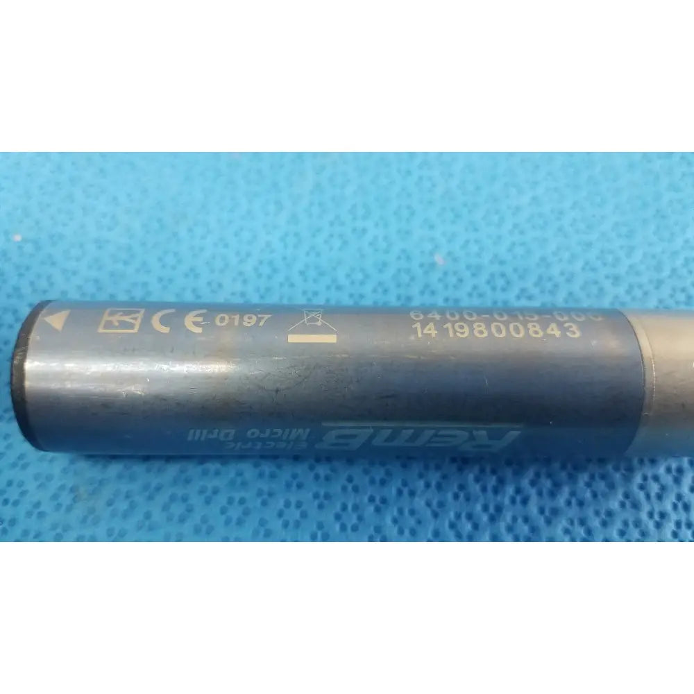 Black cylindrical battery with silver metallic ends and labeling for stryker remb electric micro drill handpiece