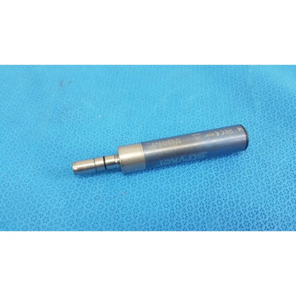 Silver-colored metallic stryker remb electric micro drill handpiece with engraved markings and cylindrical body
