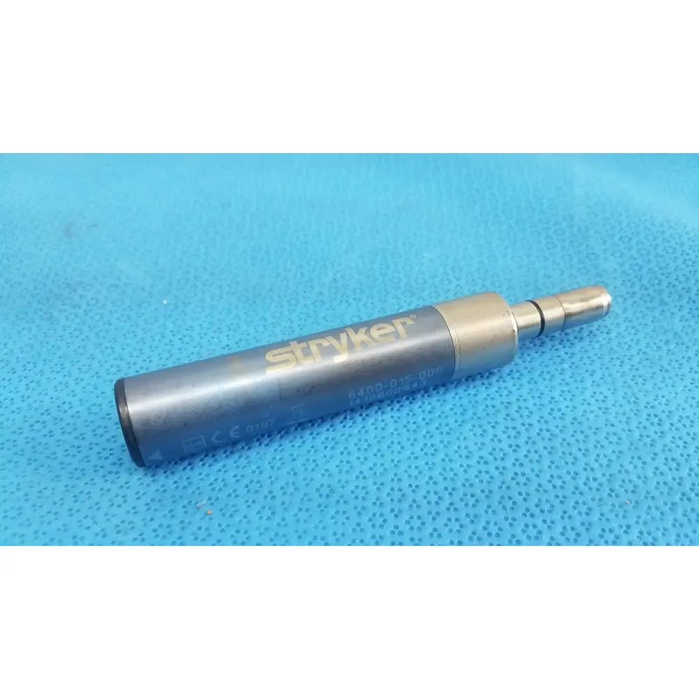 Silver metallic stryker remb electric micro drill handpiece 6400-015-000 with cylindrical body and threaded connector
