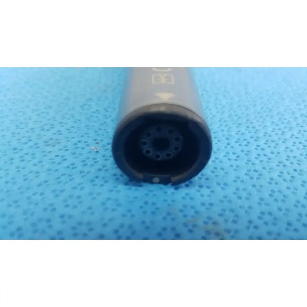 Gray cylindrical stryker remb electric cigarette with black mouthpiece and circular airflow holes for vaping use