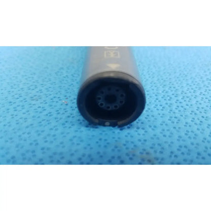 Gray cylindrical stryker remb electric cigarette with black mouthpiece and circular airflow holes for vaping use