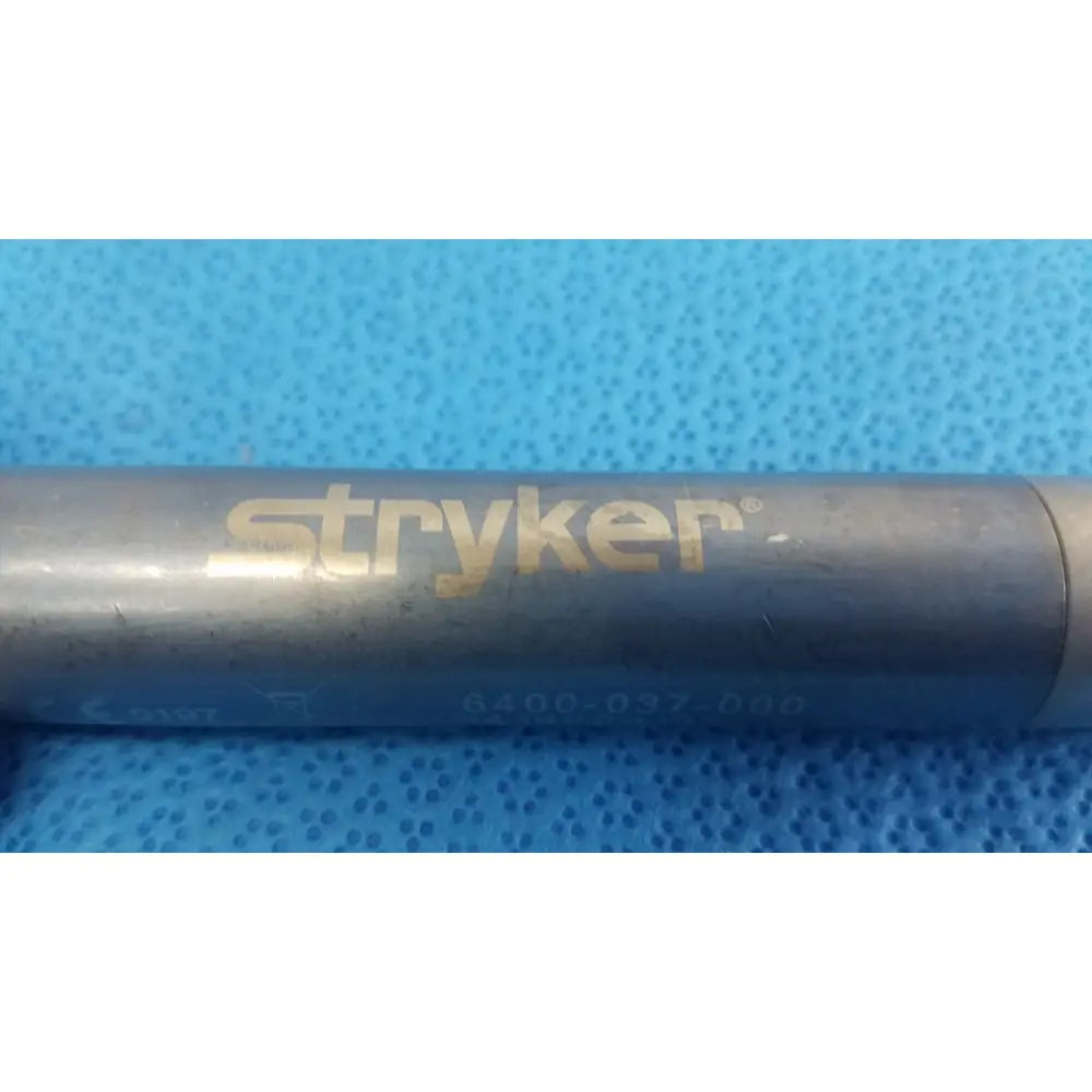Gray metallic stryker remb electric reciprocating saw with gold branding and model number 6400-037-000