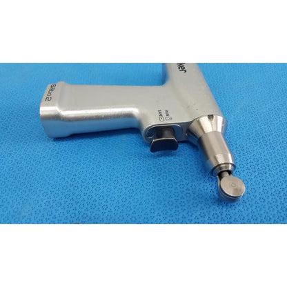 Silver saba 2 surgical drill with textured grip and black safety switch for stryker sago surgical orthopedic reciprocating saw