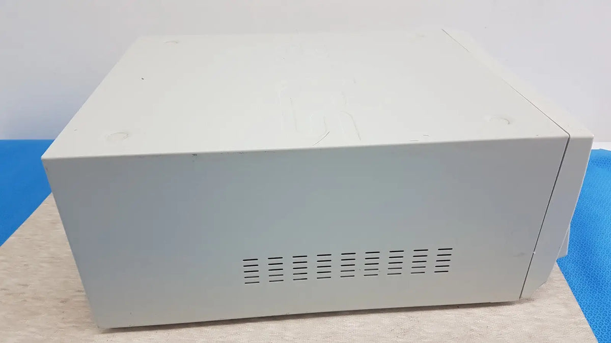 Off-white rectangular stryker sdc3 hd digital capture unit with horizontal ventilation slits on side for information management