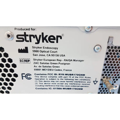 White plastic label with black text and logos on the back side of stryker sdc3 hd digital capture unit with fcc and ic compliance information