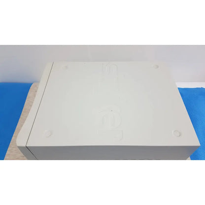 Off-white plastic sdc3 hd digital capture unit with rounded corners and four circular indentations for information management