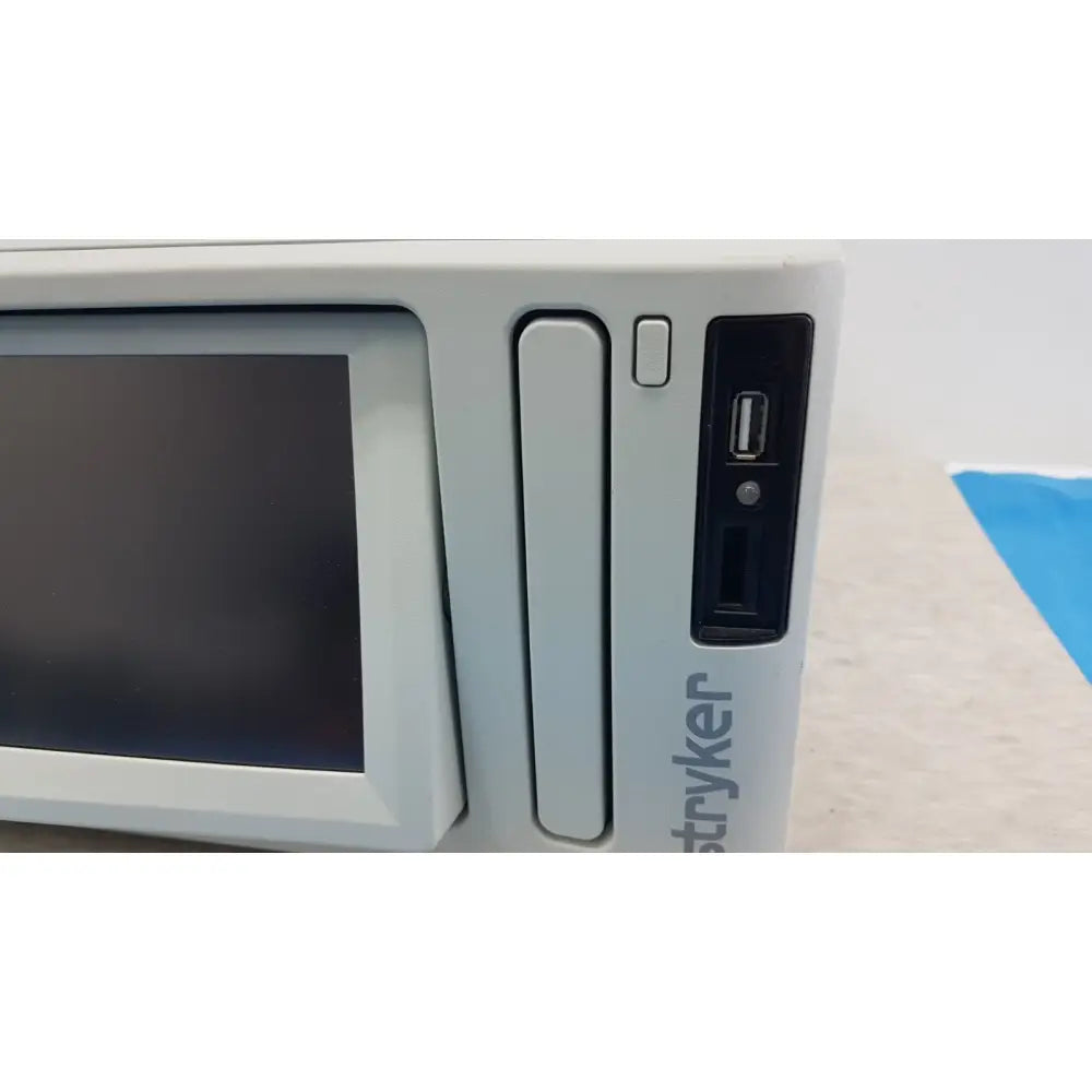 Light gray tryker sdc3 hd digital capture unit with small screen usb port and memory card slot for capture unit information