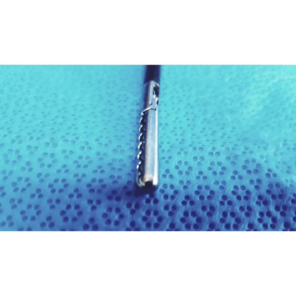 Stryker stainless steel laparoscopiic clamp with serrated toothed tip and black handle for surgical use