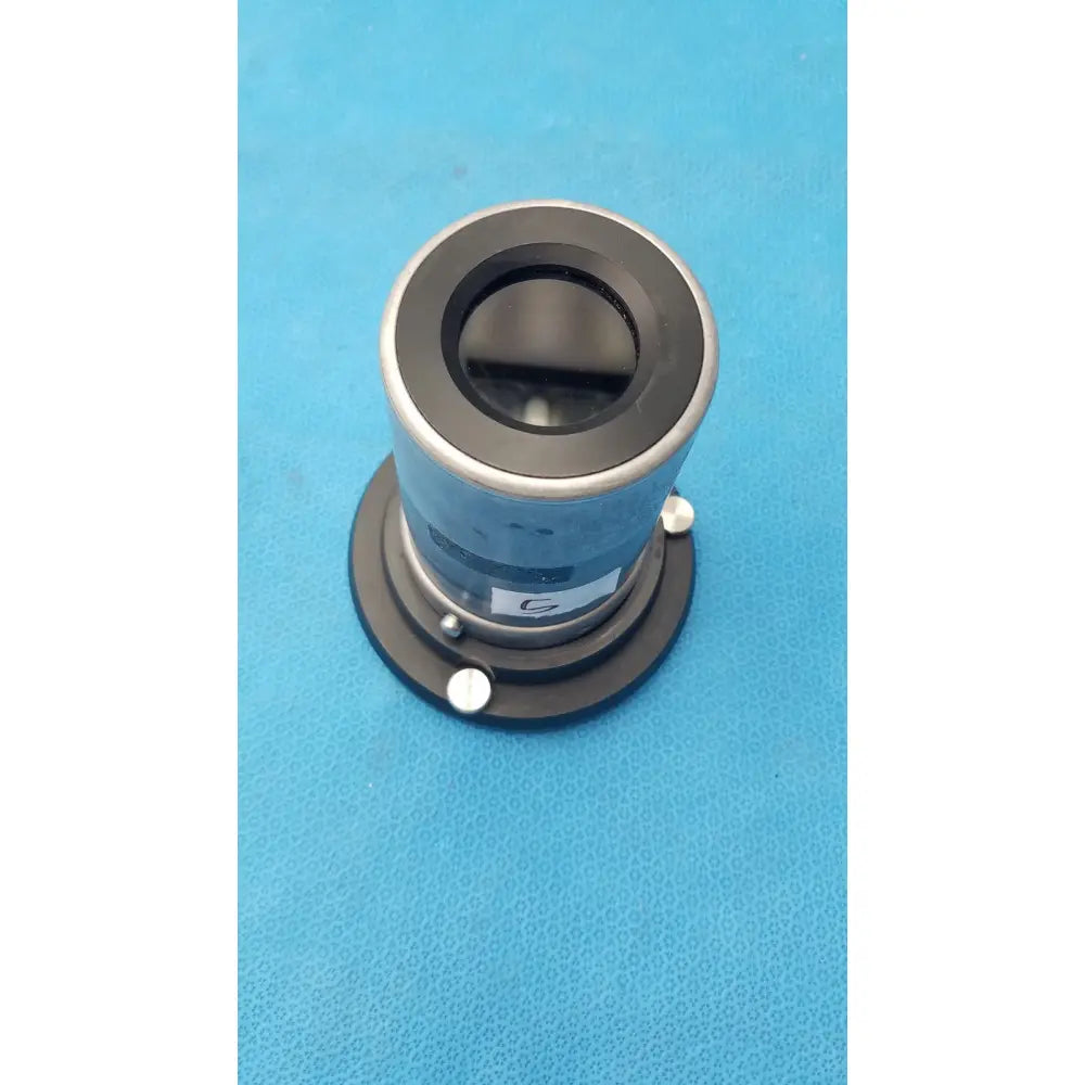 Silver and black cylindrical stryker strykecam 2 in-light camera with matte finish central aperture and mounting screws