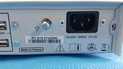 Back side of gray metal stryker suite stream hd codec with black power port and silver screws made in France