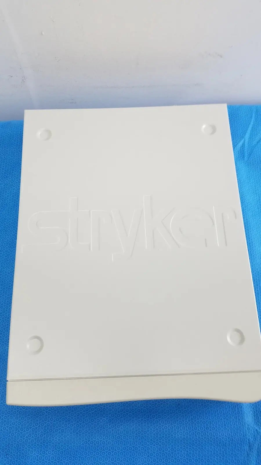 White rectangular emykorr brand box with embossed logo and indentations for stryker suite stream hd codec 0678001200