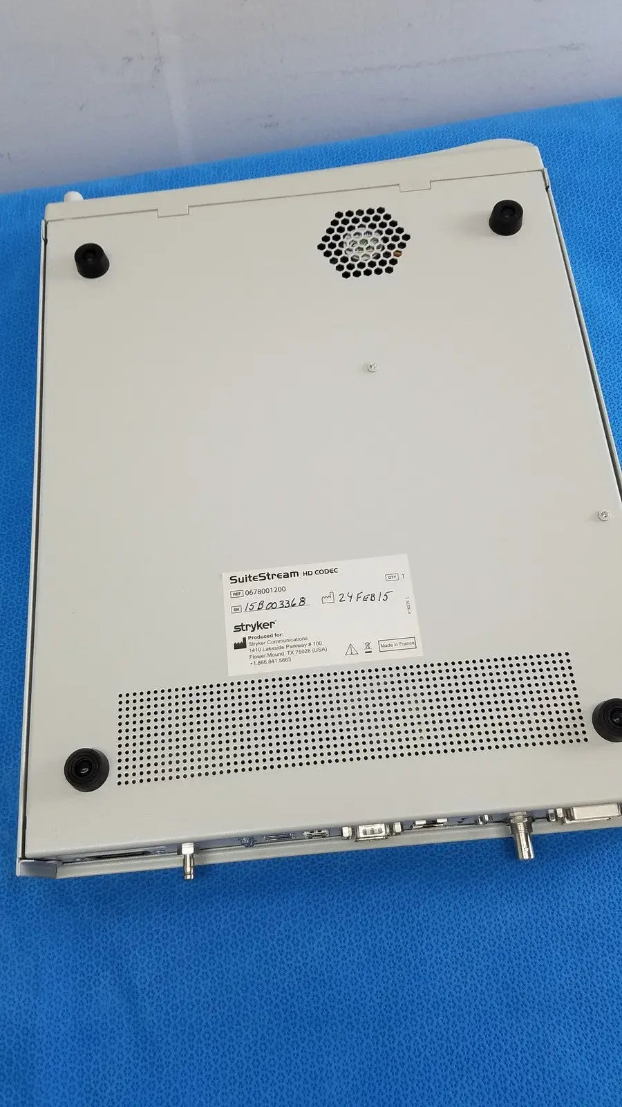 White stryker suite stream hd codec 0678001200 medical imaging device with black rubber feet and ventilation grilles visible from back