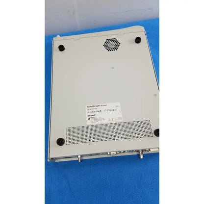 White stryker suite stream hd codec 0678001200 medical imaging device with black rubber feet and ventilation grilles visible from back