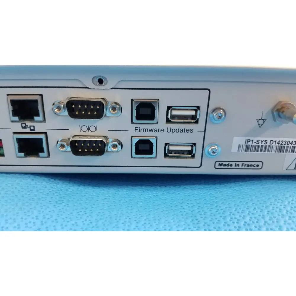 Light gray industrial network device with ethernet rs-232 and usb ports on the back for stryker suite stream hd codec