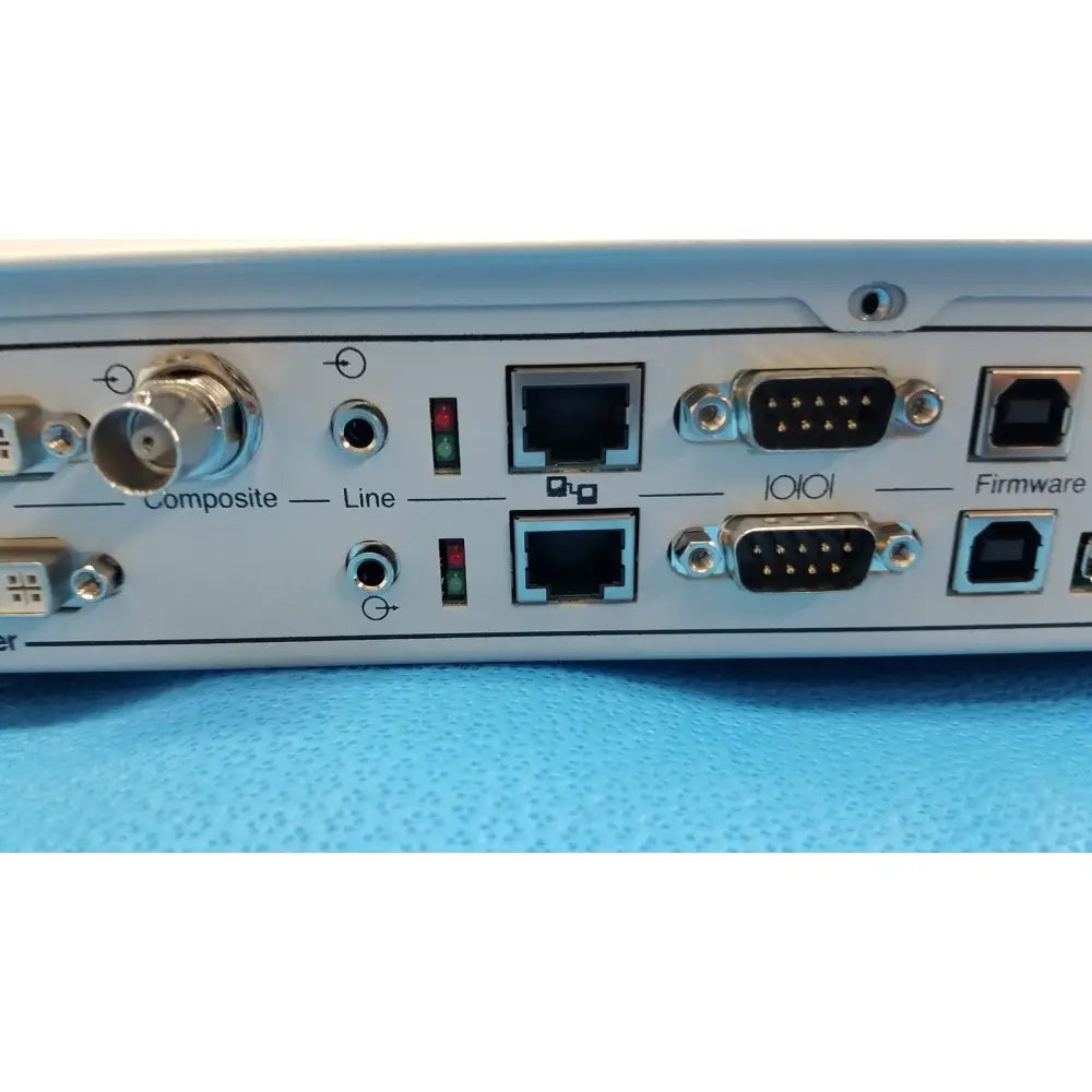 Light blue stryker suite stream hd codec 0678001200 with multiple ports including composite, line, ethernet, and serial connectors