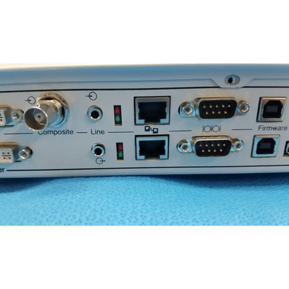 Light blue stryker suite stream hd codec 0678001200 with multiple ports including composite, line, ethernet, and serial connectors